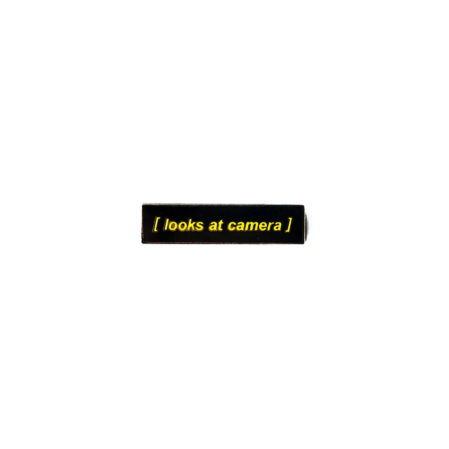 LOOKS AT CAMERA PIN - CLOSED CAPTIONS - Image 2
